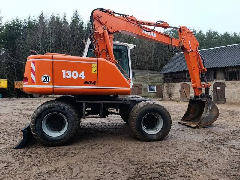 Колісний екскаватор Atlas 1304 — оренда в Одеській області, Буд Холдинг